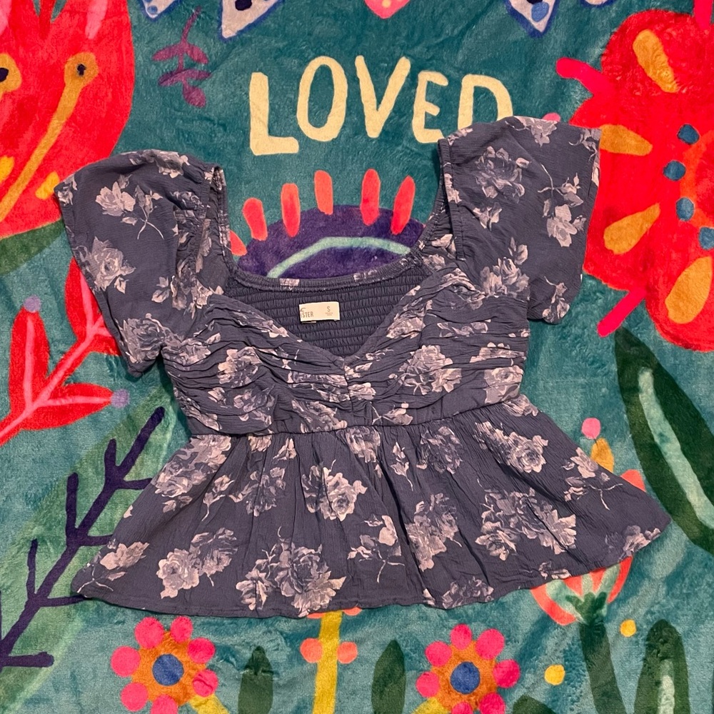 Hollister Blue Blouse with Artistic Floral Design